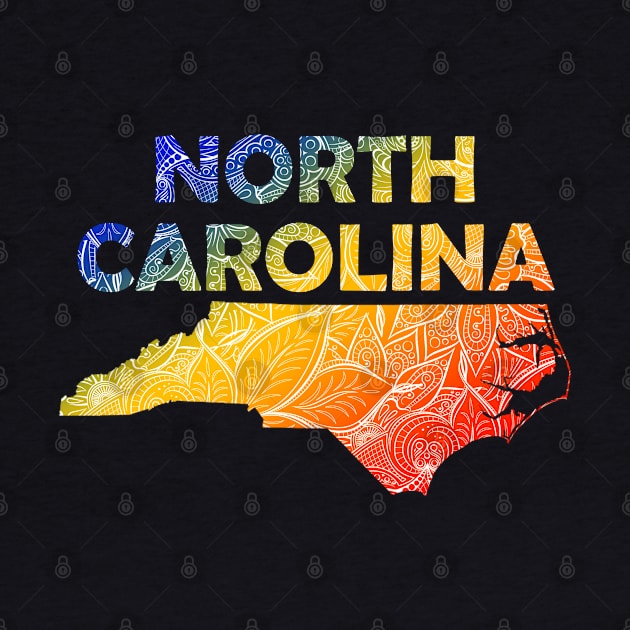 Colorful mandala art map of North Carolina with text in blue, yellow, and red by Happy Citizen